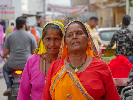 Pushkar, Rajasthan / India - November 5, 2019 : Traditional rural Indian Village Women, wearing...