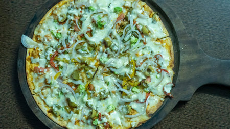 Vegetarian pizza in india. Indian Cheese Veg pizza.の写真素材