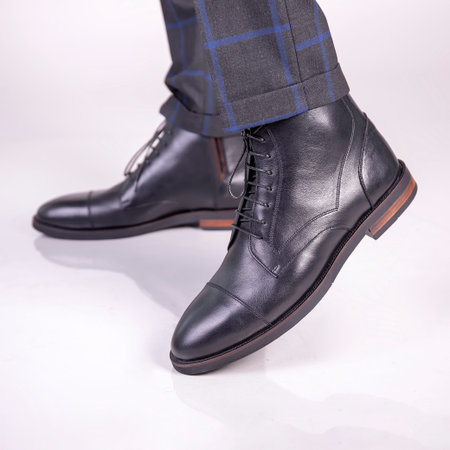 Men's black leather shoes on a white background. Mens fashion.