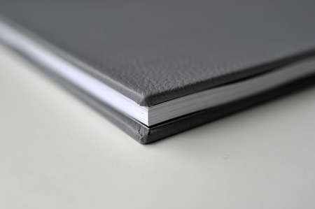 A black leather cover of bookの写真素材