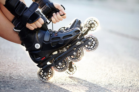 Setting of laces on black roller skates