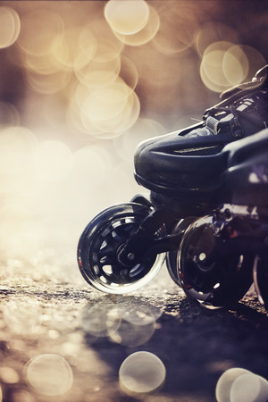Wheels of roller skates closeup in the rays of the sun.の写真素材