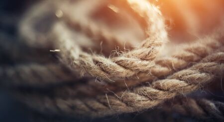 Rope close-up. Detail look of ropes texture as a background. Heavy duty rope.の写真素材