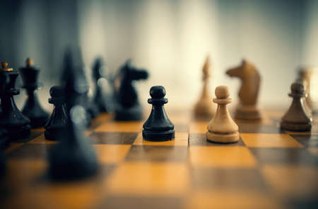 Wooden chess pieces on the chessboard. Intellectual game -chess. Chess pieces on the Board.の写真素材
