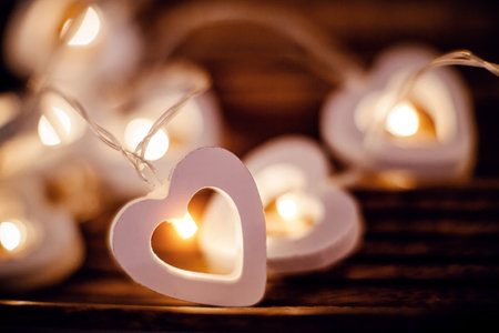 Luminous garland in the shape of hearts from LED bulbs. Valentine's Day. Love symbol. February 14. Winter holiday.の写真素材