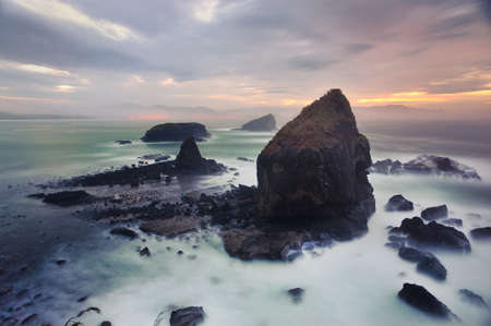 Slow shutter shot of a rocky beach Papuma, East Javaの写真素材