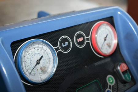 Manometer gages on equipment for filling automotive air conditioners.