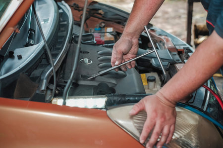 Segamat, Malaysia - November 11th , 2017 : Automobile air-conditioner servicing. Mechanic uninstall...