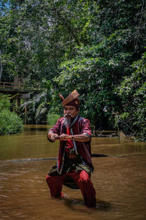 Kuantan, Malaysia - October 21st, 2017 : A Malay man with the traditional malay warrior costume performing stepsのeditorial素材