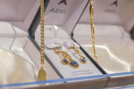 Christchurch, New Zealand â December 19th, 2017 :  Women's fashion jewellery and decorative wears made from jade  being displayed on a glass shelf.のeditorial素材