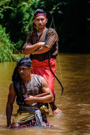 Kuantan, Malaysia - October 21st, 2017 : A group of martial artist of silat (Malay traditional self defend ) demonstrating martial art skills during Photo Outing "Senandung Anok Pahang " in Kuantanのeditorial素材