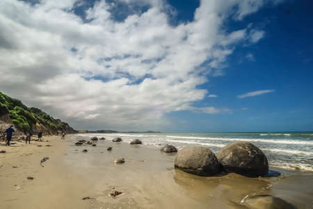 Moeraki Boulders. Rock formations  on the beach in the afternoon light, Moeraki Beach, Hampden, Otago Region, New Zealandの写真素材