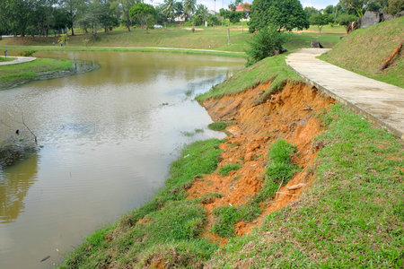 Soil erosion or landslide on the lake in the rainy season at Muadzam Shah, Malaysia.