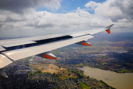 Beautiful landscape green field views from an airplane window during landing  at Auckland ...