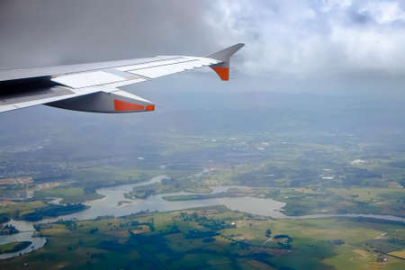 Beautiful landscape green field views from an airplane window during landing  at Auckland  International Airport,  New Zealand.の写真素材