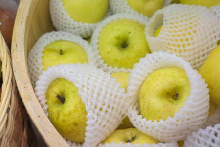 Fresh apple display for sale at marketの写真素材