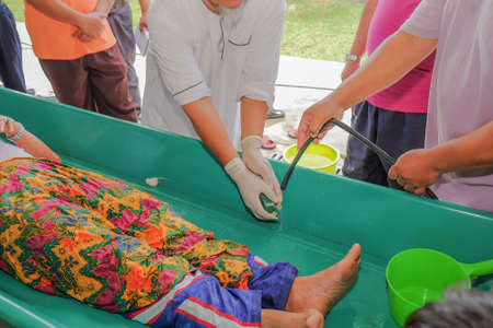 Muadzam Shah, Malaysia - March 11th, 2018: Instructors make the demonstration of the steps of bathing the corpses to prepare it for burial, in accordance with Islamic custom in the corpses management courseのeditorial素材