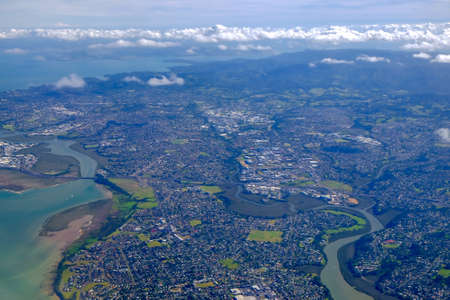 Beautiful landscaped view from plane windows while landing at airporl.の写真素材