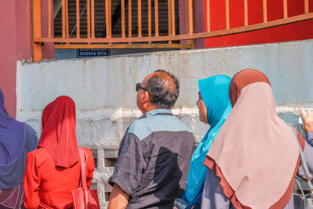 Muadzam Shah, Malaysia - May 9th, 2018: Malaysian voters line up to vote at the election center during the 2018 Malaysia General Election on May 9, 2018, in Muadzam Shah, Malaysia.のeditorial素材