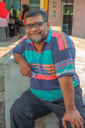 Muadzam Shah, Malaysia - May 9th, 2018: Malaysian voters line up to vote at the election center...