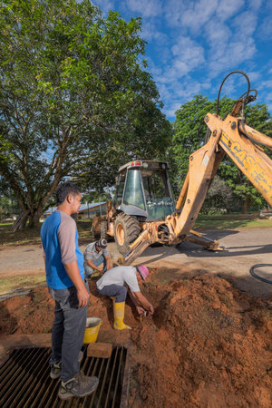 Muadzam Shah, Malaysia -  August 30th, 2018  : Pipe contractor install new HDPE pipes under the road...
