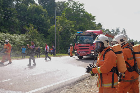 Muadzam Shah, Pahang - October 18th, 2018 : Fireman using water and extinguisher to fighting with...