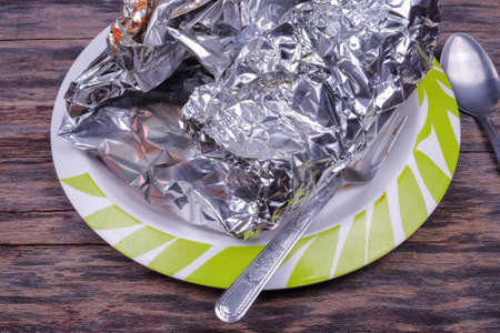 Grilled stingray wing in aluminum foil with hot spicy ready to serveの写真素材