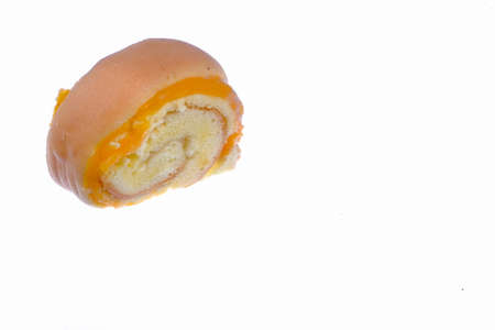 Roll cake  butter cream filling isolated on white background.の写真素材