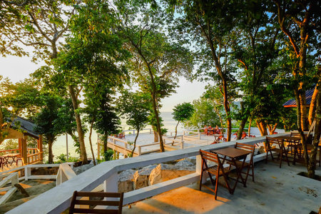 Perhentian Island, Malaysia - August 15th, 2018 : Dining tables of a resort restaurant on a tropical...