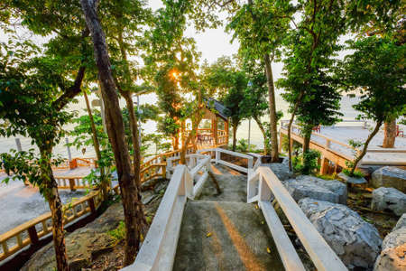 Dining tables of a resort restaurant on a tropical Perhentian Island, Malaysia.の写真素材
