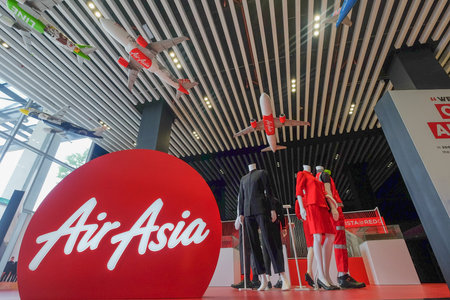 Sepang, Malaysia - March 28th, 2019 : Air Asia's uniform at reception area in AirAsiaâ€™s...