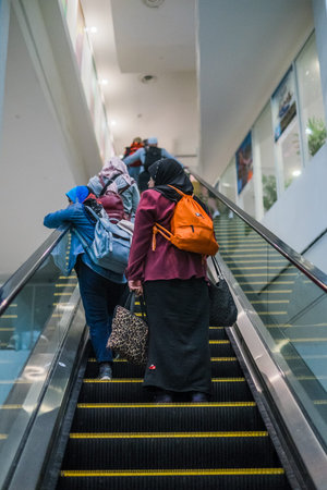 Sepang, Malaysia - Disember 21st, 2017 : Airplane Boarding.  Passengers carrying the hand luggage...