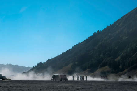 BROMO, INDONESIA -August 3rd, 2019 : Colourful tourist jeeps with horse at the parking areas near Hindu temple Pura Luhur Poten, Bromo crater in savanna of Tengger caldera at Mt. Bromo, East Java.のeditorial素材