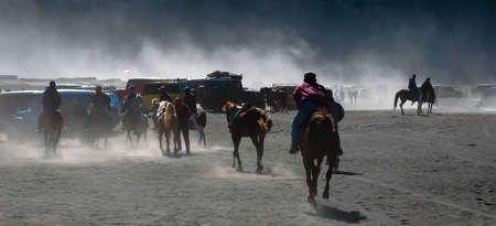 BROMO, INDONESIA -August 3rd, 2019 : Colourful tourist jeeps with horse at the parking areas near Hindu temple Pura Luhur Poten, Bromo crater in savanna of Tengger caldera at Mt. Bromo, East Java.のeditorial素材