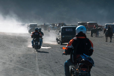 BROMO, INDONESIA -August 3rd, 2019 : Colourful tourist jeeps with horse at the parking areas near...