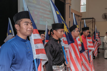 Muadzam Shah, Malaysia - August 8th, 2019 : Malaysian college students with Malaysian Flag during...