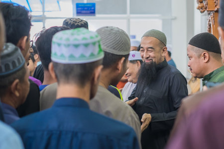 Muadzam Shah, Malaysia - August 24th, 2019 :Muslim people shake hands after the religious talk by...