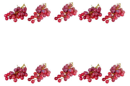 Fresh bunch of grapes on plate isolated on white backgroundの写真素材