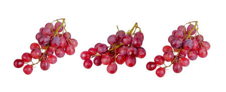 Fresh bunch of grapes on plate isolated on white backgroundの写真素材