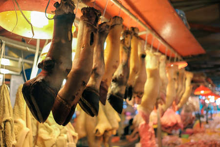 Beef slice hang on the rail in the market for sale.の写真素材