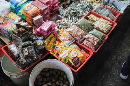 Kuala Lumpur, Malaysia - December 2nd, 2019 :  Vegetable vendor at a market in the morning .のeditorial素材
