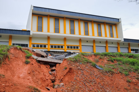Drain damage. Soil erosion or landslide  in the slope  during  the rainy season at Muadzam Shah,...