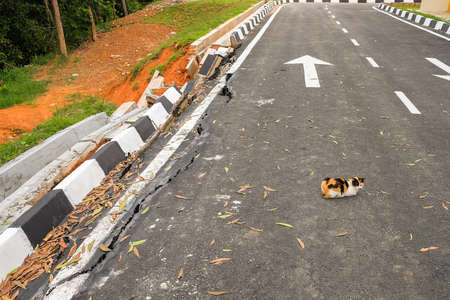 Drain damage. Soil erosion or landslide  in the slope  during  the rainy season at Muadzam Shah, Malaysia.の写真素材