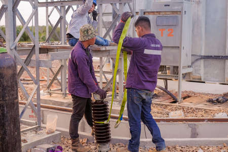 Muadzam Shah, Malaysia - January 9th, 2020 : Unidentified electrician work installation of high voltage in high voltage stations.のeditorial素材