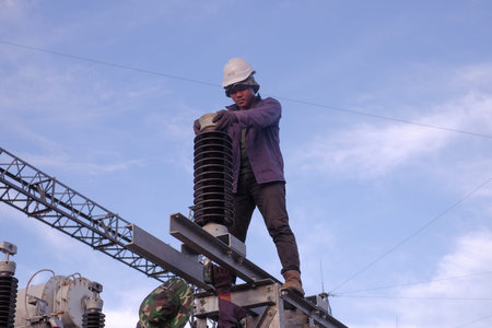 Muadzam Shah, Malaysia - January 9th, 2020 : Unidentified electrician work installation of high...