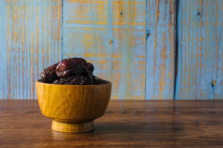 Dates Fruit In A Wooden Bowl
