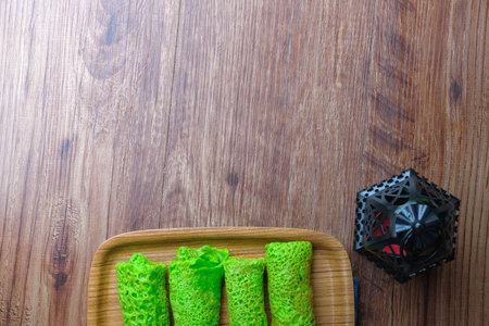 Malaysian's local food , Kuih Lenggang or Kuih Ketayap shoot with natural light. Ramadan, breakfast.の写真素材