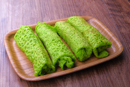 Malaysian's local food , Kuih Lenggang or Kuih Ketayap shoot with natural light. Ramadan, breakfast.の写真素材