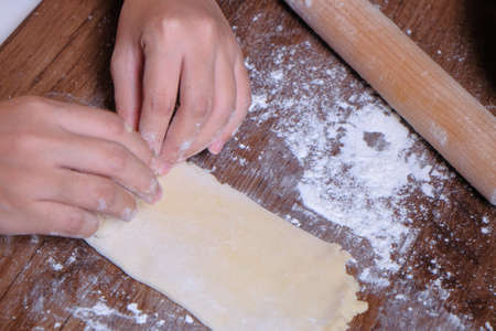Woman making curry puff.の写真素材