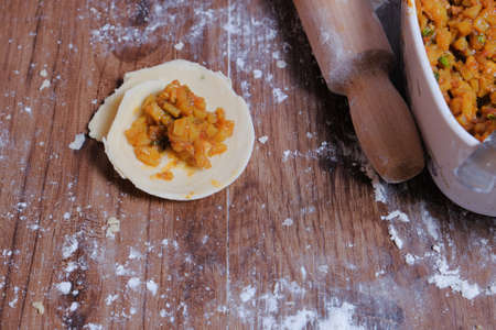 Woman making curry puff.の写真素材